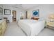 Main bedroom featuring a bed, vanity, and access to the Primary bath at 100 Bluff View Dr # 511C, Belleair Bluffs, FL 33770