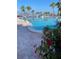 A lovely swimming pool with tropical flowers next to the water, perfect for a refreshing dip at 100 Bluff View Dr # 511C, Belleair Bluffs, FL 33770