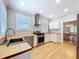 Modern kitchen with stainless steel appliances, butcher block countertops, and plenty of natural light at 1019 E Mohawk Ave, Tampa, FL 33604