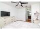 Bright bedroom with ample natural light, hardwood floors, and a neutral color palette offering a relaxing and airy ambiance at 10265 Gandy N Blvd # 1702, St Petersburg, FL 33702