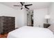 Spacious main bedroom with ceiling fan, wood floors, and ensuite access at 10265 Gandy N Blvd # 1702, St Petersburg, FL 33702