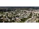 An aerial view showcases the property's location within a vibrant neighborhood close to commercial development at 10408 118Th Ave, Largo, FL 33773