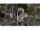 An aerial view of the property and its lot lines shows its location among neighboring homes at 10408 118Th Ave, Largo, FL 33773