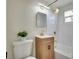 Bathroom featuring a wooden vanity, sleek fixtures, and a shower-tub combo at 10408 118Th Ave, Largo, FL 33773