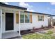 Close up of the entrance of this home, with nice landscaping and new shutters at 10408 118Th Ave, Largo, FL 33773