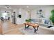 This spacious living room with hardwood floors flows into an eat-in kitchen at 10408 118Th Ave, Largo, FL 33773