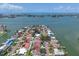 Stunning aerial shot of a neighborhood, highlighting the property's proximity to the water and beautiful surroundings at 11490 48Th N Ave, St Petersburg, FL 33708