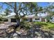 Inviting single-story home with a well-maintained front yard and a brick-paved driveway at 11490 48Th N Ave, St Petersburg, FL 33708