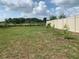 Well-maintained backyard with privacy fence, offering a serene outdoor retreat at 11513 Andy Dr, Riverview, FL 33569