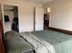 Bedroom showcasing a bed, closet, and doorway at 11513 Andy Dr, Riverview, FL 33569