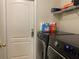Functional laundry room with modern washer and dryer, providing convenience for chores at 11513 Andy Dr, Riverview, FL 33569