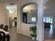 Open concept living space showcasing the kitchen, dining, and Gathering rooms, with tile floors throughout at 11513 Andy Dr, Riverview, FL 33569