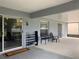 Covered patio with bench seating and sliding glass doors at 11513 Andy Dr, Riverview, FL 33569