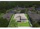 Aerial view of property featuring a large backyard with a vinyl fence at 1342 Salmonberry St, Wesley Chapel, FL 33543
