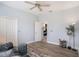 Bright living room with light walls and flooring, plus a ceiling fan at 1342 Salmonberry St, Wesley Chapel, FL 33543