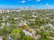 This home features solar panels in a prime location, surrounded by lush greenery and city views at 1400 Cherry Ne St, St Petersburg, FL 33704