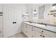 A luxurious bathroom with double sinks, decorative mirrors, and plenty of counter space at 1400 Cherry Ne St, St Petersburg, FL 33704