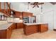 A gourmet kitchen featuring stainless steel appliances, custom cabinets, and a spacious central island at 1400 Cherry Ne St, St Petersburg, FL 33704