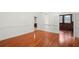 Spacious living room featuring hardwood floors and a view into another room at 1400 Cherry Ne St, St Petersburg, FL 33704