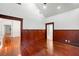 Spacious room featuring beautiful wood trim, hard wood floors and an open floor plan at 1400 Cherry Ne St, St Petersburg, FL 33704