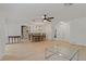 Spacious open-concept living room with hardwood floors and ample natural light at 1401 Camelot Ct, Palm Harbor, FL 34684