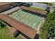 Overhead view of the community's multiple shuffleboard courts with covered seating at 1401 Camelot Ct, Palm Harbor, FL 34684