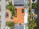 Aerial view of a home highlighting the private backyard with a pool, patio area, and boat dock at 1424 47Th Ne Ave, St Petersburg, FL 33703