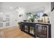 Great bar area with wine fridge, cabinetry, and natural light, perfect for entertaining at 1424 47Th Ne Ave, St Petersburg, FL 33703