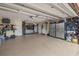 Spacious garage featuring epoxy floors, overhead storage, and tool storage cabinets at 1424 47Th Ne Ave, St Petersburg, FL 33703