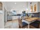 Beautiful kitchen with stainless steel appliances, white cabinets, and eat-in breakfast bar at 1424 47Th Ne Ave, St Petersburg, FL 33703