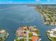 Wide aerial view showcasing a waterfront home community with canals providing access to Tampa Bay at 1917 Iowa Ne Ave, St Petersburg, FL 33703