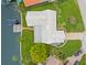 An overhead view of the house showcasing its yard, roof and waterside access at 1917 Iowa Ne Ave, St Petersburg, FL 33703
