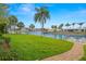 Lush backyard featuring a private boat dock and expansive water views at 1917 Iowa Ne Ave, St Petersburg, FL 33703