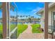 Backyard view from the screened lanai, out to the waterfront and private boat dock at 1917 Iowa Ne Ave, St Petersburg, FL 33703