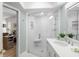 Bright bathroom with a new glass enclosed shower and granite vanity, overlooking the office at 1917 Iowa Ne Ave, St Petersburg, FL 33703