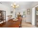 A dining room that flows into a living room with views of the water at 1917 Iowa Ne Ave, St Petersburg, FL 33703