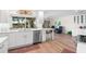 Bright kitchen with white cabinets, stainless steel appliances, and a view of the waterfront at 1917 Iowa Ne Ave, St Petersburg, FL 33703