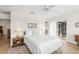 Bright main bedroom with view to lanai and ensuite bath at 1917 Iowa Ne Ave, St Petersburg, FL 33703