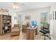Comfortable office with lots of natural light, wood floors, and a neutral color palette at 1917 Iowa Ne Ave, St Petersburg, FL 33703