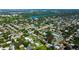 Residential neighborhood featuring tree-lined streets, well-maintained homes, and access to a nearby lake at 2010 6Th Sw Ave, Largo, FL 33770