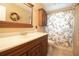 Well-maintained bathroom featuring a vanity, cabinet storage, and a shower at 2010 6Th Sw Ave, Largo, FL 33770
