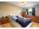 bedroom with a Star Wars theme featuring a comfy bed and two dressers at 2010 6Th Sw Ave, Largo, FL 33770