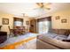 Open concept living space with hardwood floors, comfortable seating, and a dining area at 2010 6Th Sw Ave, Largo, FL 33770