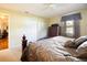 Comfortable main bedroom offering closet space, a soft carpet, and natural light at 2010 6Th Sw Ave, Largo, FL 33770
