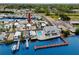 Waterfront community featuring private docks, a communal pool, and charming single-Gathering homes with water access at 2011 Ketch Cir, Palm Harbor, FL 34683