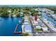 Quaint waterfront community offering boat docks and pool access in a scenic coastal setting at 2011 Ketch Cir, Palm Harbor, FL 34683