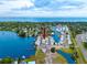 Waterfront property with canal access, surrounded by lush greenery and serene open waters at 2011 Ketch Cir, Palm Harbor, FL 34683