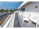 Balcony with serene waterfront views and comfortable outdoor seating at 2011 Ketch Cir, Palm Harbor, FL 34683