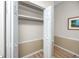 Bedroom closet with shelf and clothes rod at 2011 Ketch Cir, Palm Harbor, FL 34683