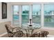 Bright dining area with beautiful water view at 2011 Ketch Cir, Palm Harbor, FL 34683